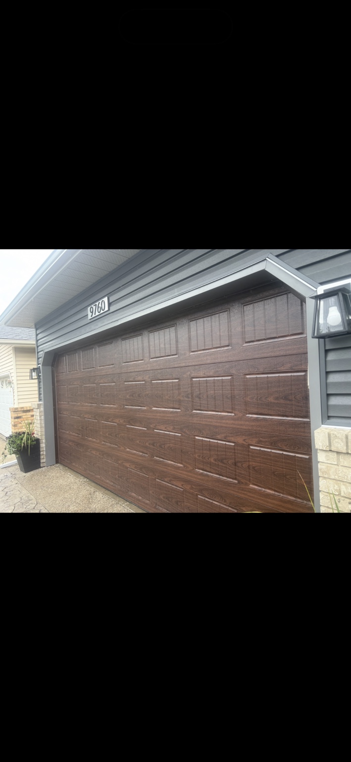 Wood-look garage door and coordinated exterior trim