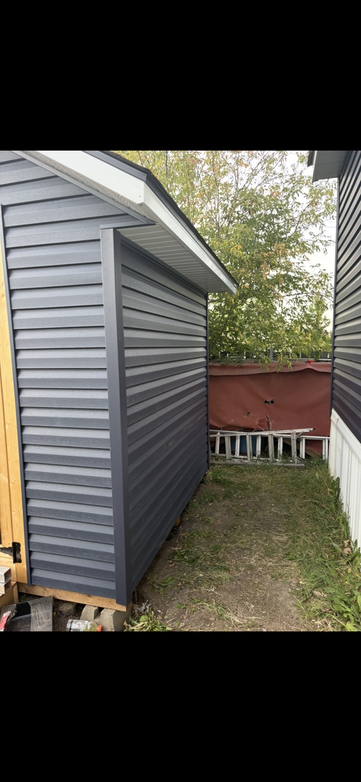 Shed side elevation and roof-edge finish
