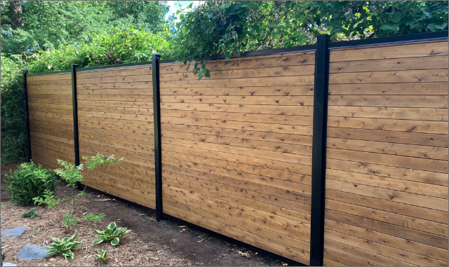 Completed horizontal wood privacy fence