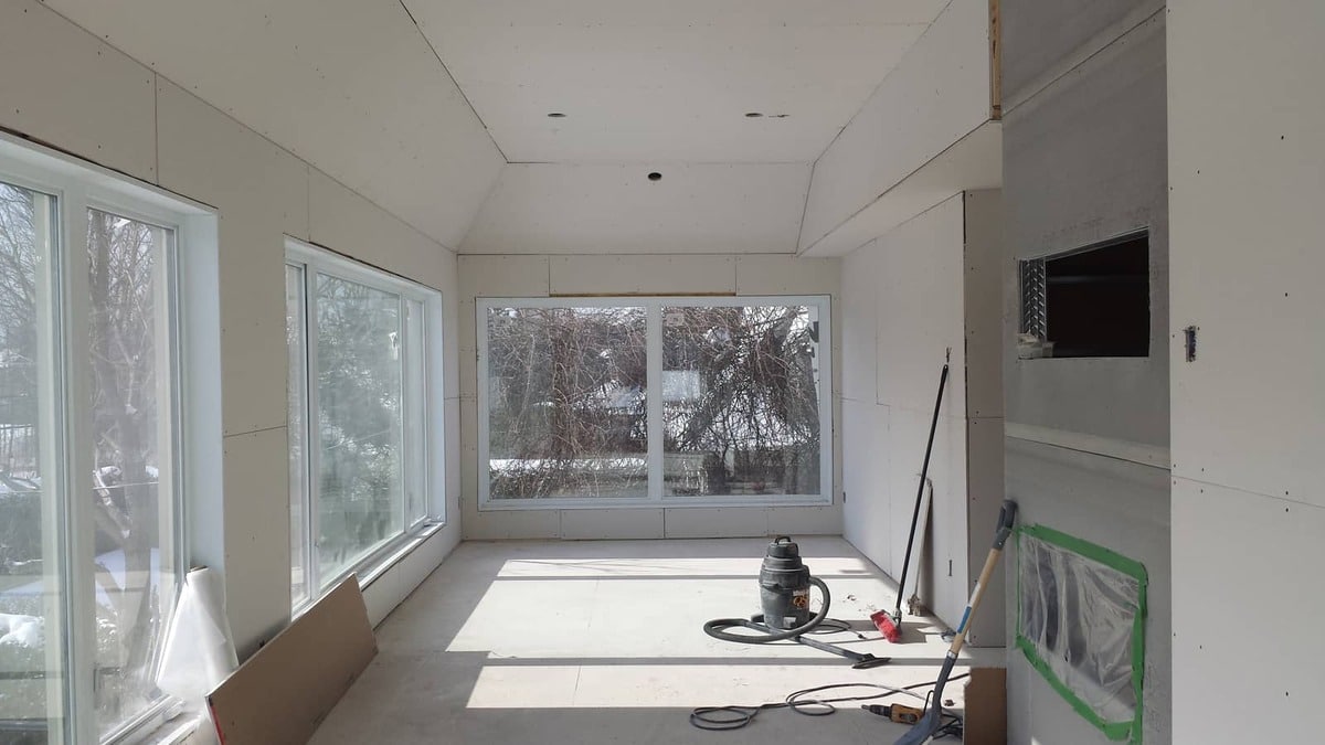 New large windows in an unfurnished room under renovation